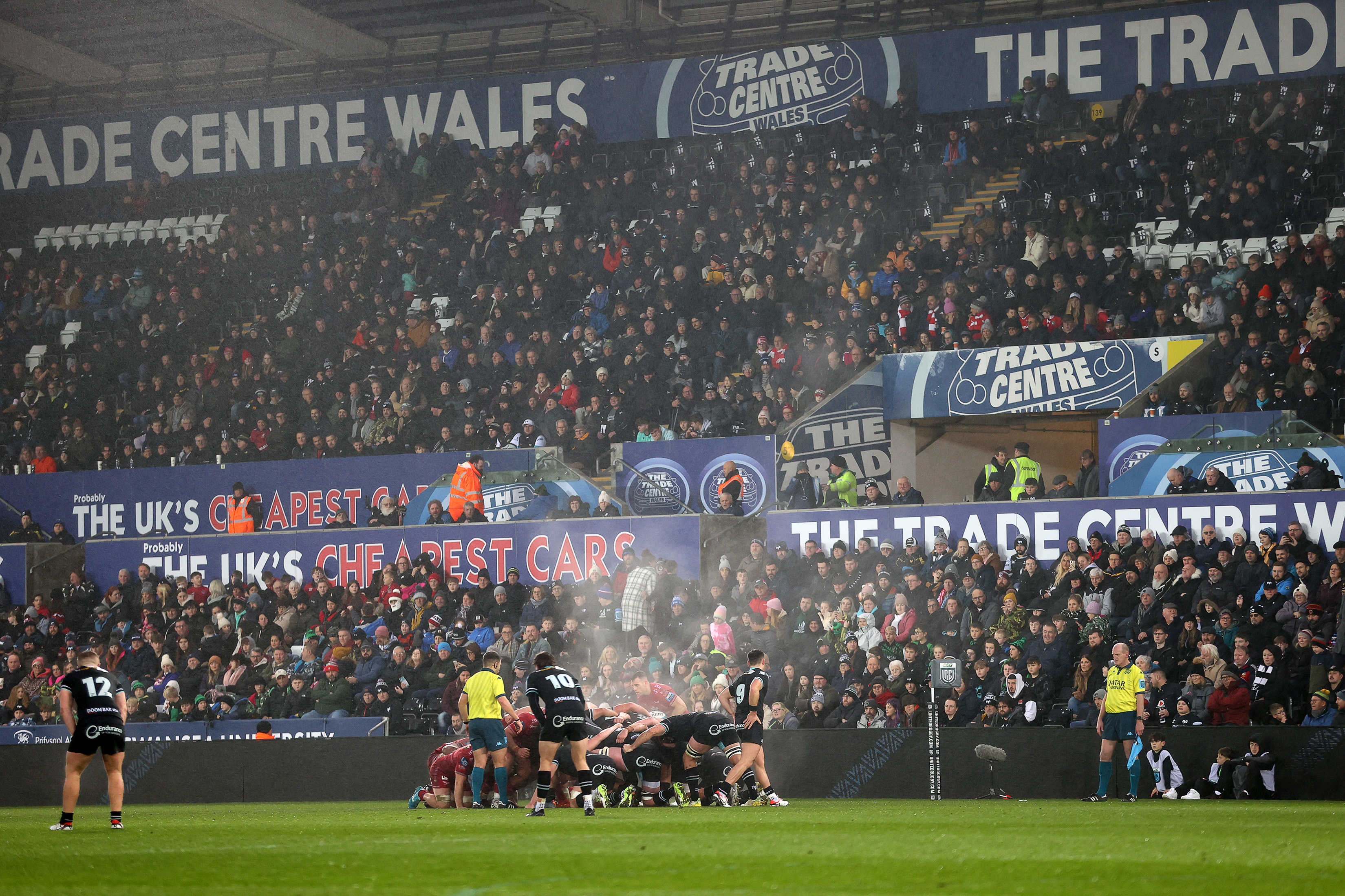 Steam rises from a scrum at a bust West Wales Derby 