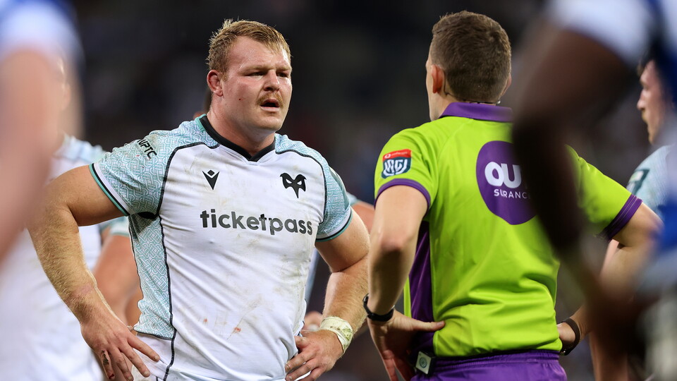 Dewi Lake talks to the referee as he captains the Ospreys 