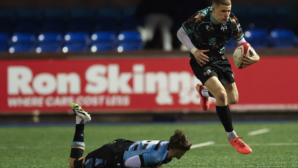 Dylan Quinn evades a Cardiff defender 