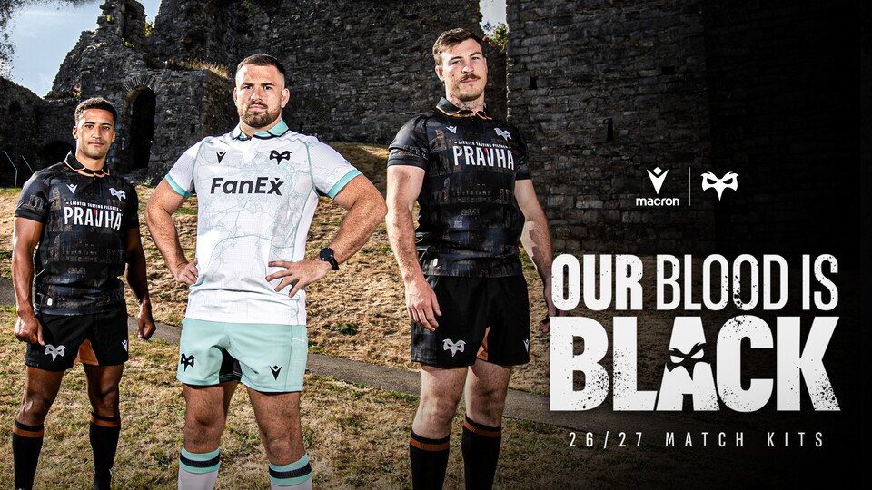 Built for St Helen's: Ospreys Unveil 2026/27 Kit. Keelan Giles, Morgan Morris and Ryan Smith pose in the foreground of Oystermouth Castle, Mumbles, revealing Ospreys 26 27 Macron kit, ready to wear at the club's first season with St Helen's as their permanent home 
