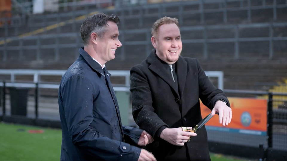 Robert Stewart, Leader of Swansea Council and James Davies-Yandle of Y11 cut the ribbon to open the redeveloped St Helen's 