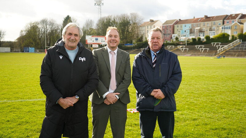 Representatives of Ospreys Rugby, Swansea Council and Swansea RFC under the posts at St Helens 