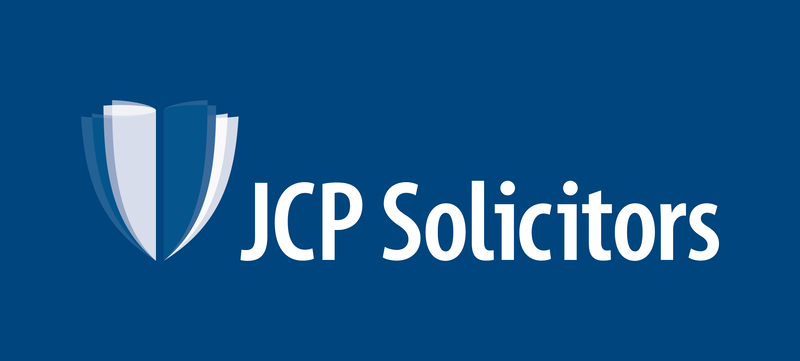 JCP Solicitors white logo on a dark blue background